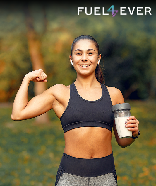 iMAGE SHOWS A GIRL STANDING AND HOLDING SHAKER IN HER HAND