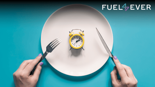 Image shows mini timer watch on plate and hands of human holding the spoons