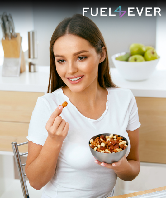 Girl holding bowl in her hand full of nuts and eating them