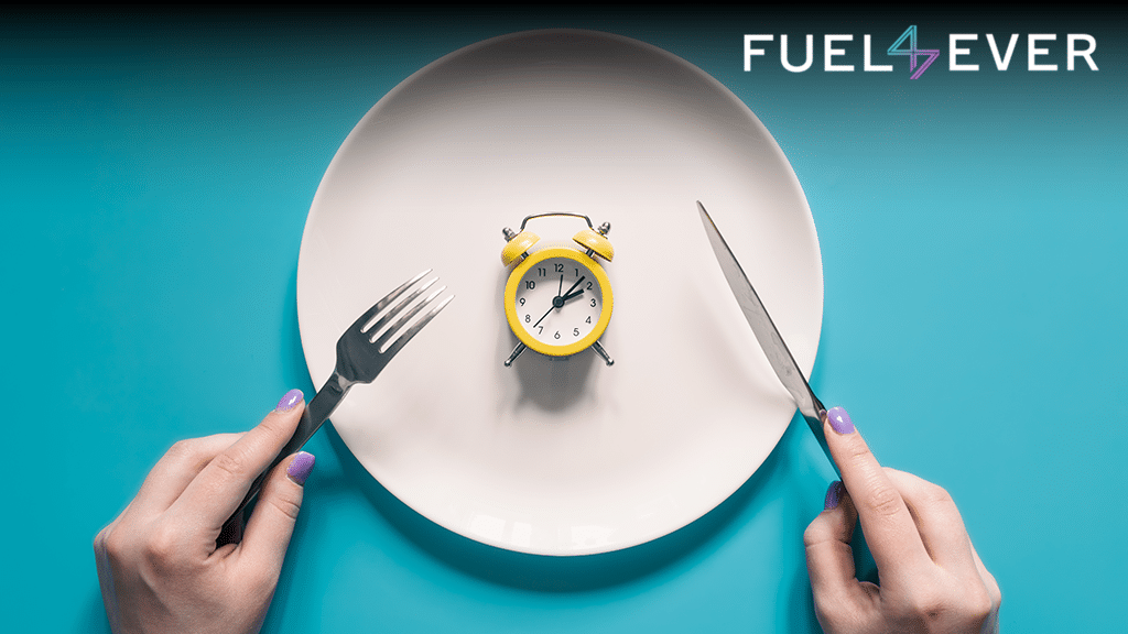 Image shows mini timer watch on plate and hands of human holding the spoons